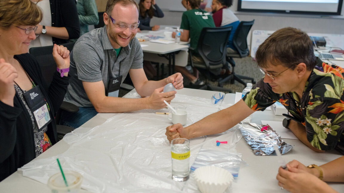Teaching fellows at Knowles Teacher Initiative conducting a science experiment