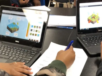 Close up image of students at Knowles Teacher Initiative working on project